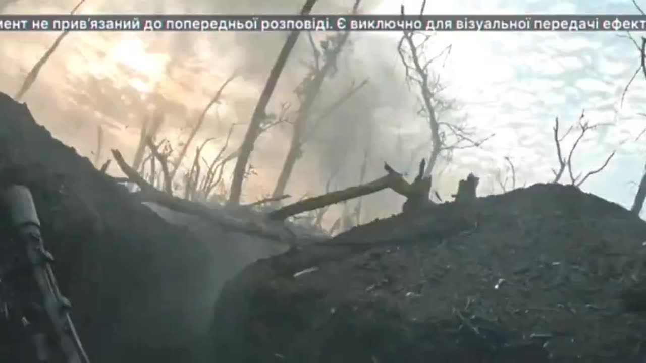 A Russian artillery attack on targets in a Ukrainian trench.