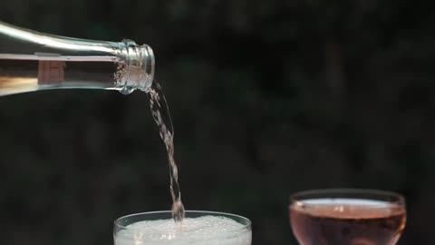 Rosé champagne poured into the glass