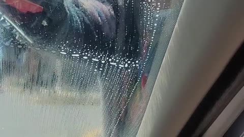 Car Window Cleaner Asks for Card Payment