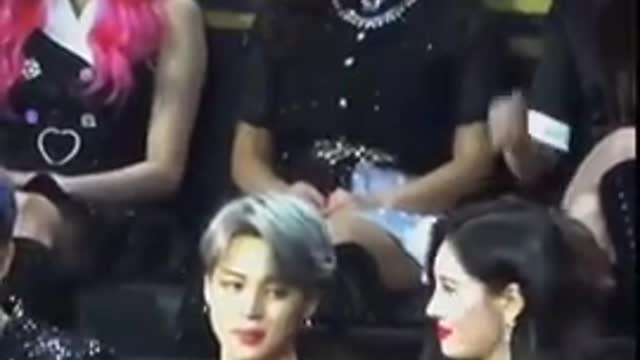 Jimin and Sunmi eye contact