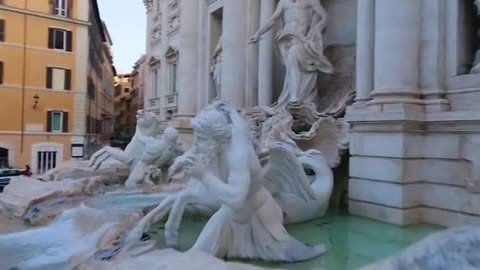 THE FAMOUS TREVI FOUNTAIN IN ROME ITALY~IN 2023 EARNED A RECORD €1.6 MILLION~THIS HAPPENS THANKS TO THE TRADITION OF THROWING COINS INTO THE FOUNTAIN TO RETURN