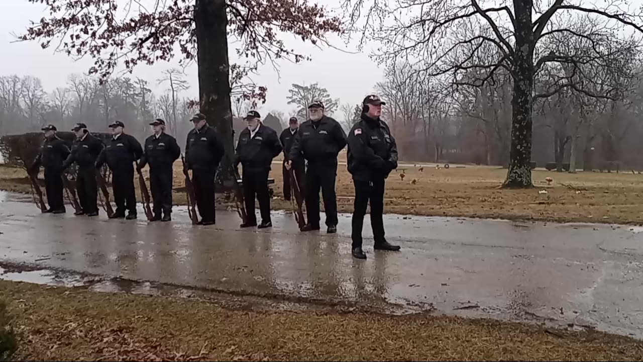 21 Gun Salute and Taps Honoring an American Military Veteran at His burial