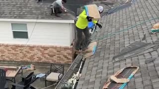 Roofer Appears to Float Up Ladder