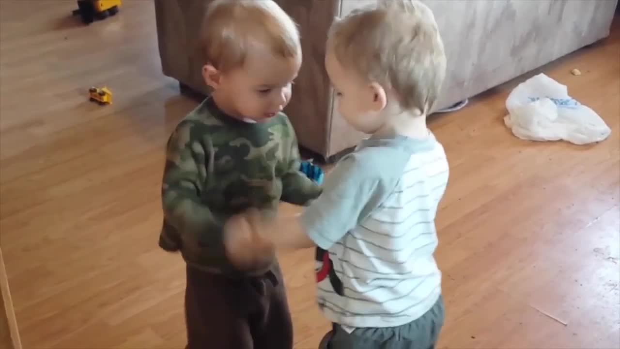 Funny Twins Babies Playing Together