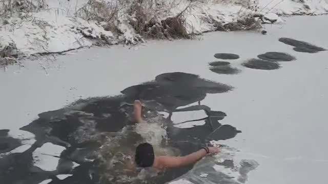 Crazy Russian Guy Can't Brake Through Ice