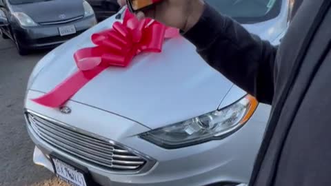 Giving a stranger a new car