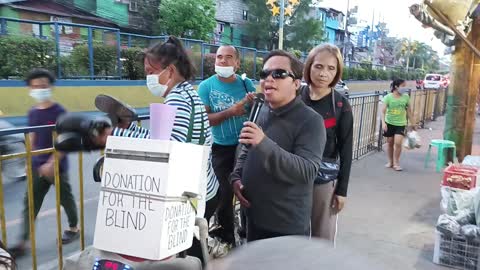 Five blind singing in the street, for small amount of money for food