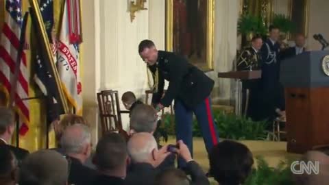 Little boy steals show at medal ceremony