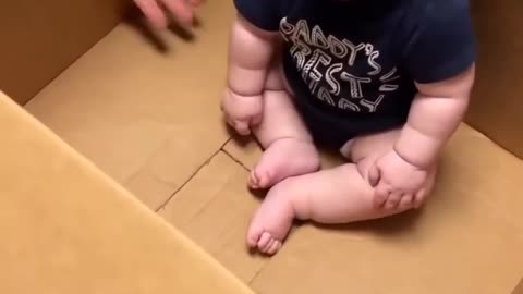 Cute baby laughing 💝 in a box 🎁