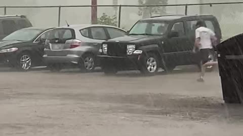 Idiot runs through heavy rain.