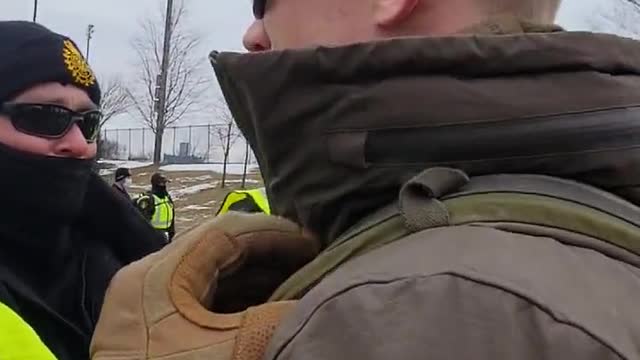 Veterans have formed a line between Trucker protesters and Police in Windsor