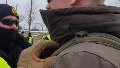 Veterans have formed a line between Trucker protesters and Police in Windsor