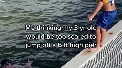 Me thinking my 3 yr old would be too scared to jump off a 6 ft high pier