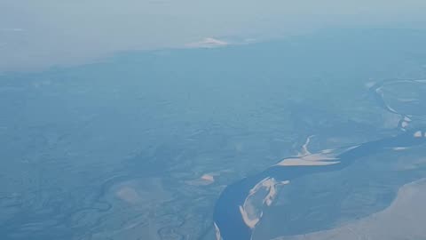 A River Seen from an Airplane Window