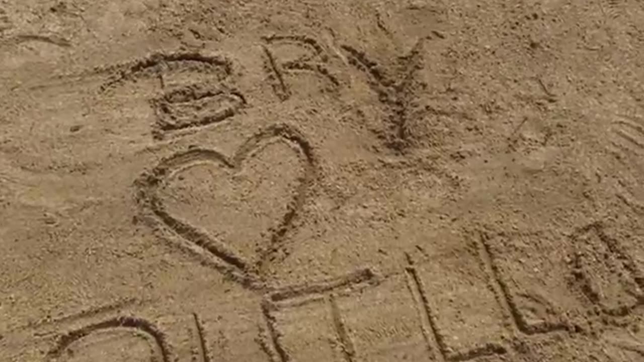 Paradise is anywhere you can write in the sand.