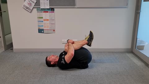 Supine double leg tuck