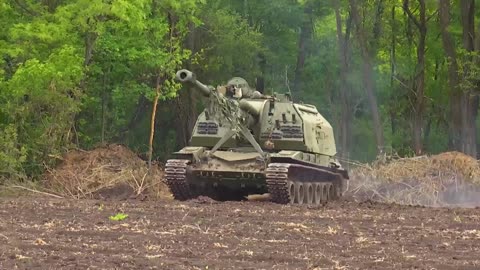 Msta-S self-propelled howitzers crews carrying out firing mission to destroy AFU defensive structure