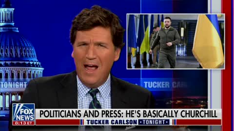 Tucker drapes a Ukrainian flag in our congress.
