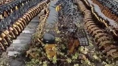A graveyard of electric green scooters that have run out of battery life