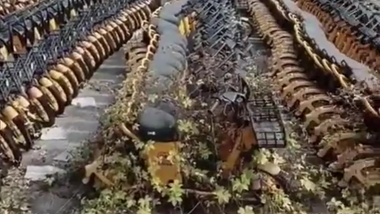 A graveyard of electric green scooters that have run out of battery life