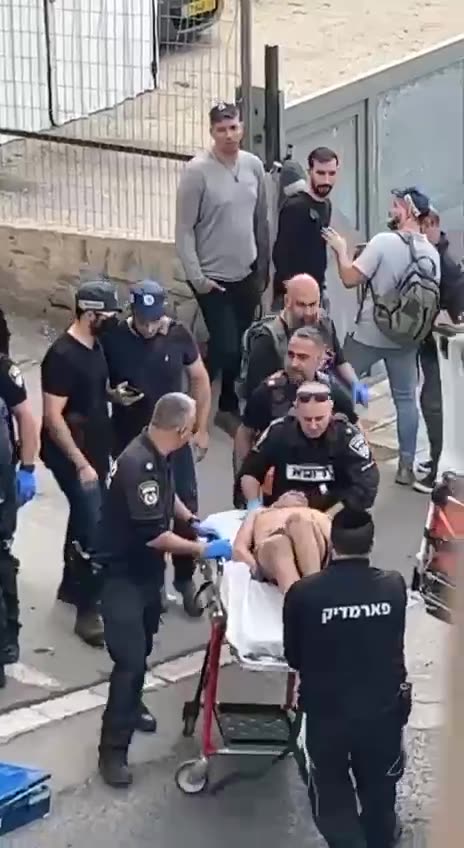 A 13 year old Jihadi Youth is treated by Israeli police after stabbing a pedestrian