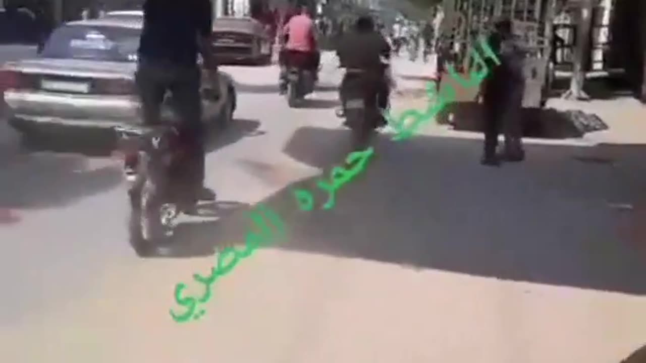 Palestinian Terrorists Carrying Off Female Hostage