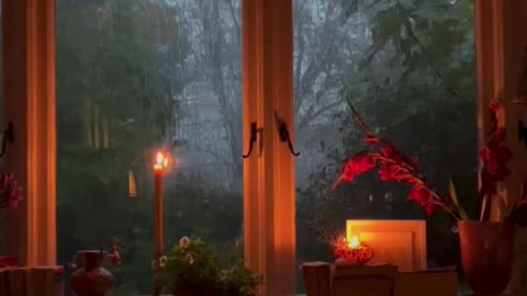 Rain on window with thunderstorms