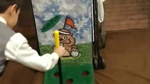 Gopher golf carnival party game at a wedding reception at the spring event venue in Angleton Texas