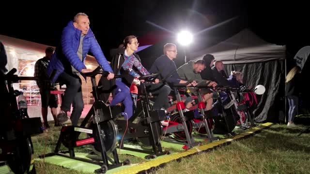 Warsaw moviegoers pedal to power outdoor cinema