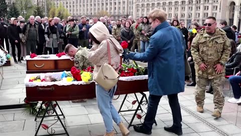 ‘He loved Ukraine the most’: Mourners lay soldiers to rest