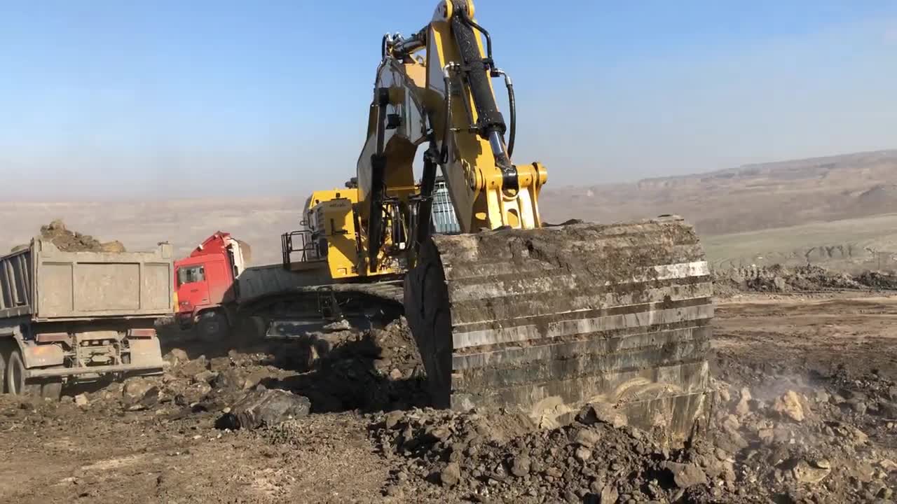 Caterpillar 6015B Excavator Loading Trucks With Two Passes - Sotiriadis Mining Works