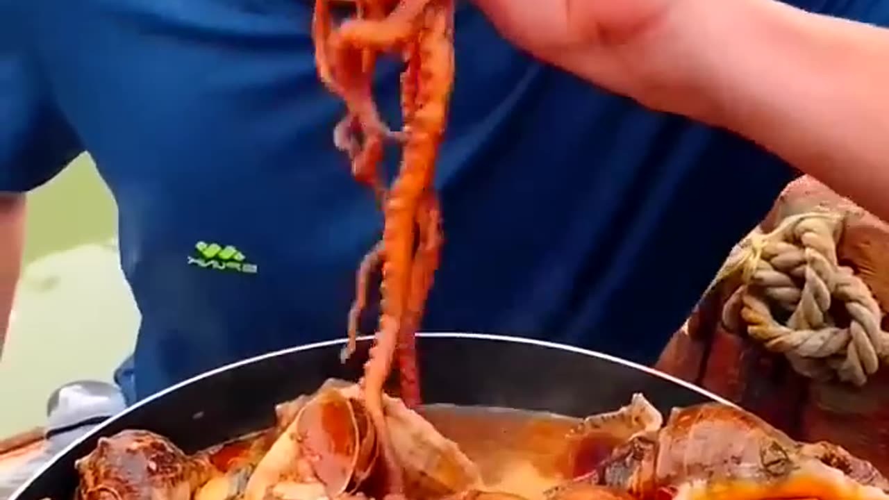 Chinese fisherman cooking and Eating fresh seafood