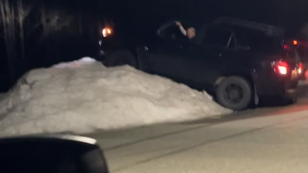 Friend's Car Climbs Snowbank