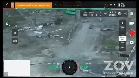 Russian BTR comes to evacuate a few Russian troops in the vicinity - where fighting continues