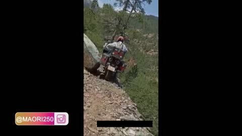 MAN TRYING TO PASS ON A MOTORCYCLE THROUGH A NARROW PLACE AND SEE WHAT HAPPENS