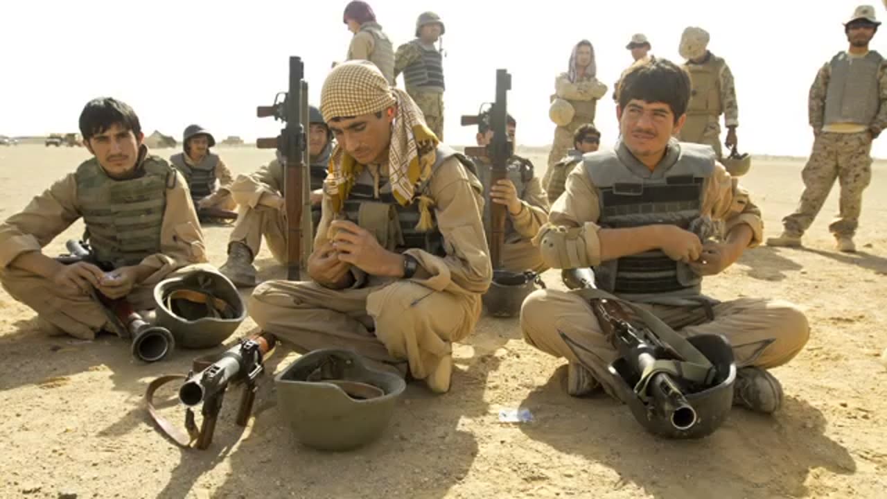 Marines teach Afghan National Army soldiers to fire rocket propelled grenades