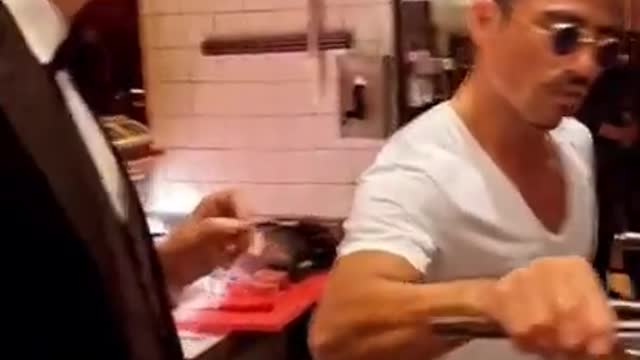 Sexy Chef prepares steak for Andrea Bocelli and Steve Harvey