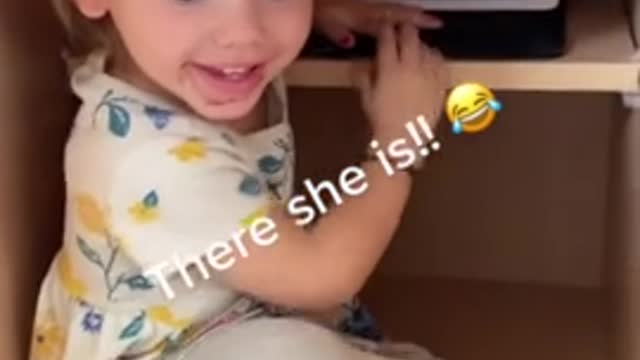 Toddler hides in kitchen cabinet to watch movie