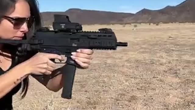 Hot Israeli girl shooting B&T APC9