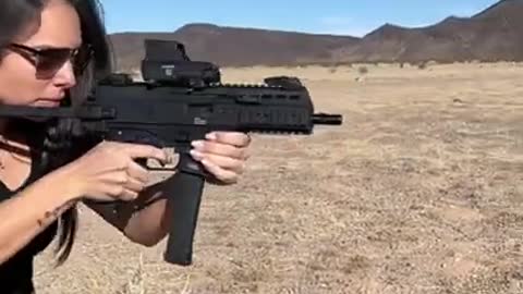 Hot Israeli girl shooting B&T APC9