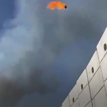 Isreali soldiers use catapult to start fires