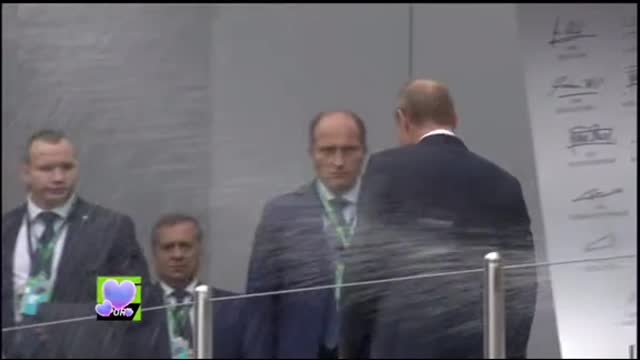 Putin Gets" Splashed With the Champagne