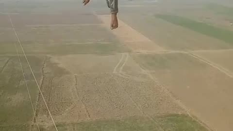 Man working on high tension wire