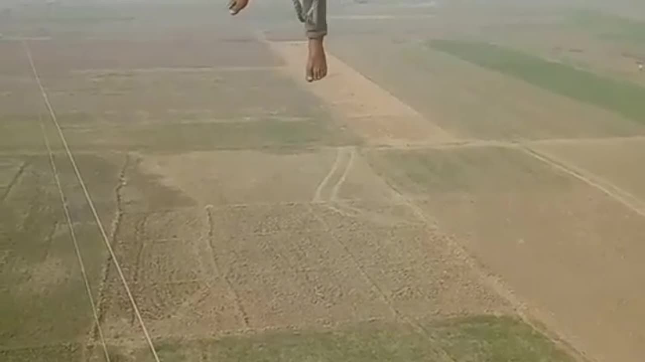 Man working on high tension wire