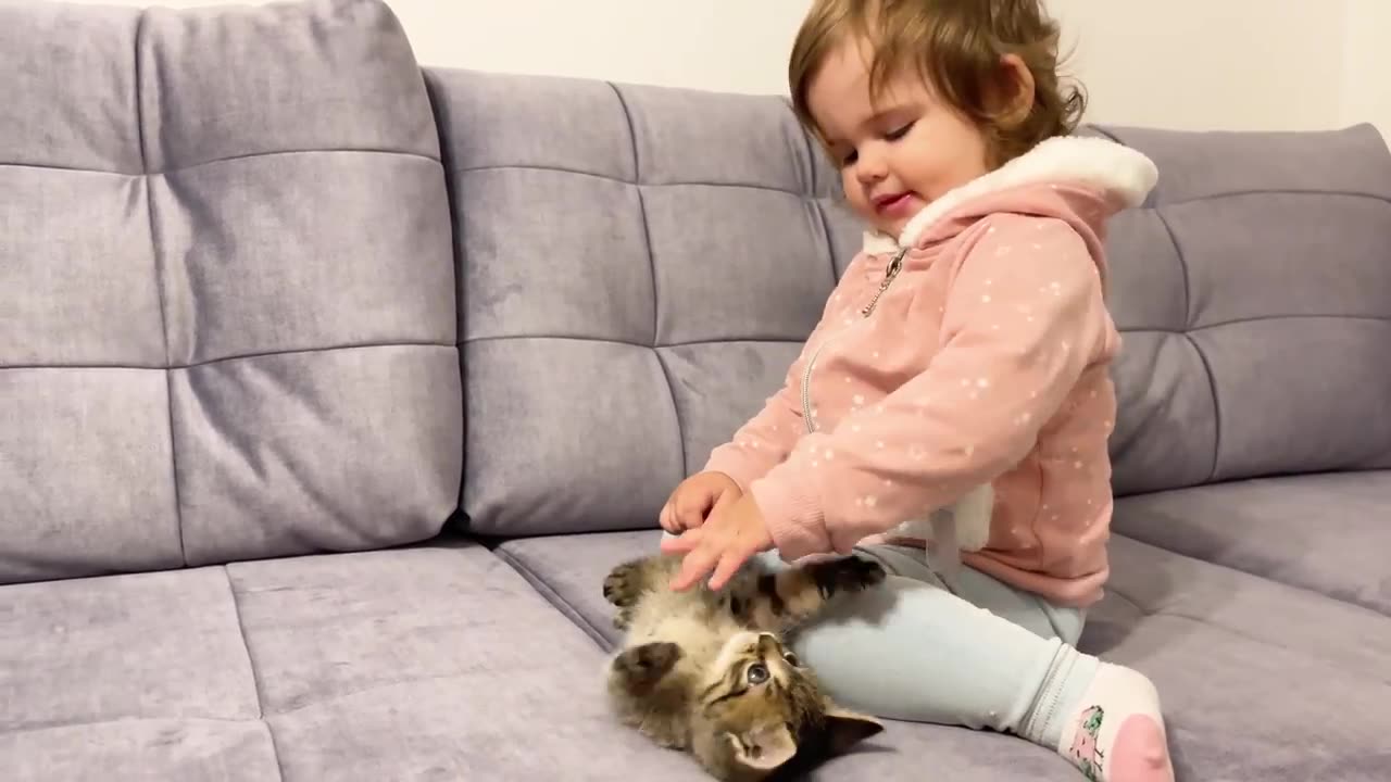 Cut baby with cute cat