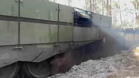 A Russian 2022 T-72B3M tank destroys a Ukrainian militant stronghold near Kremenna.