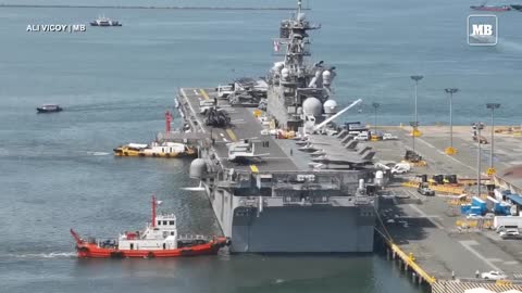 USS Tripoli docks in Manila for a port call