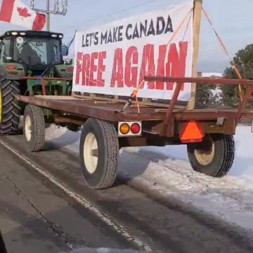 Tractors in Beamsville Ontario line-up to join the convoy