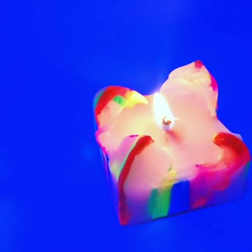 Fluorescent cube candle