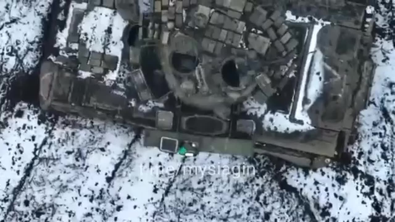 Incredible Slow Motion Footage of Next-Level Grenade Drop into the Hatch of a Tank